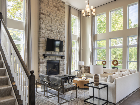 Baily Farm interior: a large living room with couch, chairs, table and television