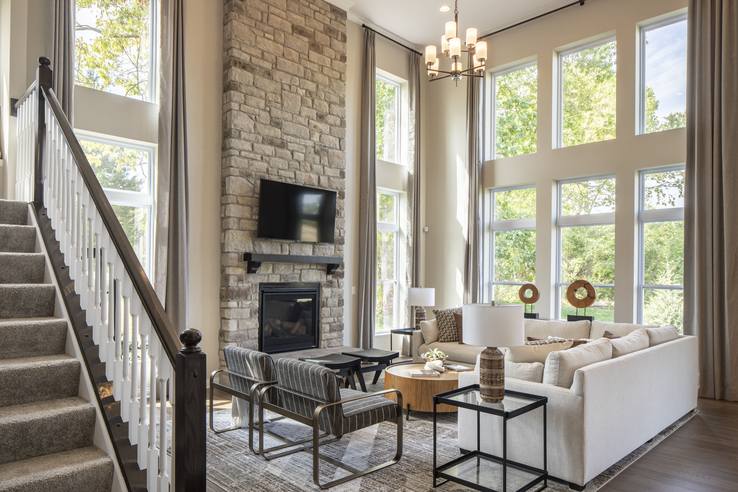 Baily Farm interior: a large living room with couch, chairs, table and television